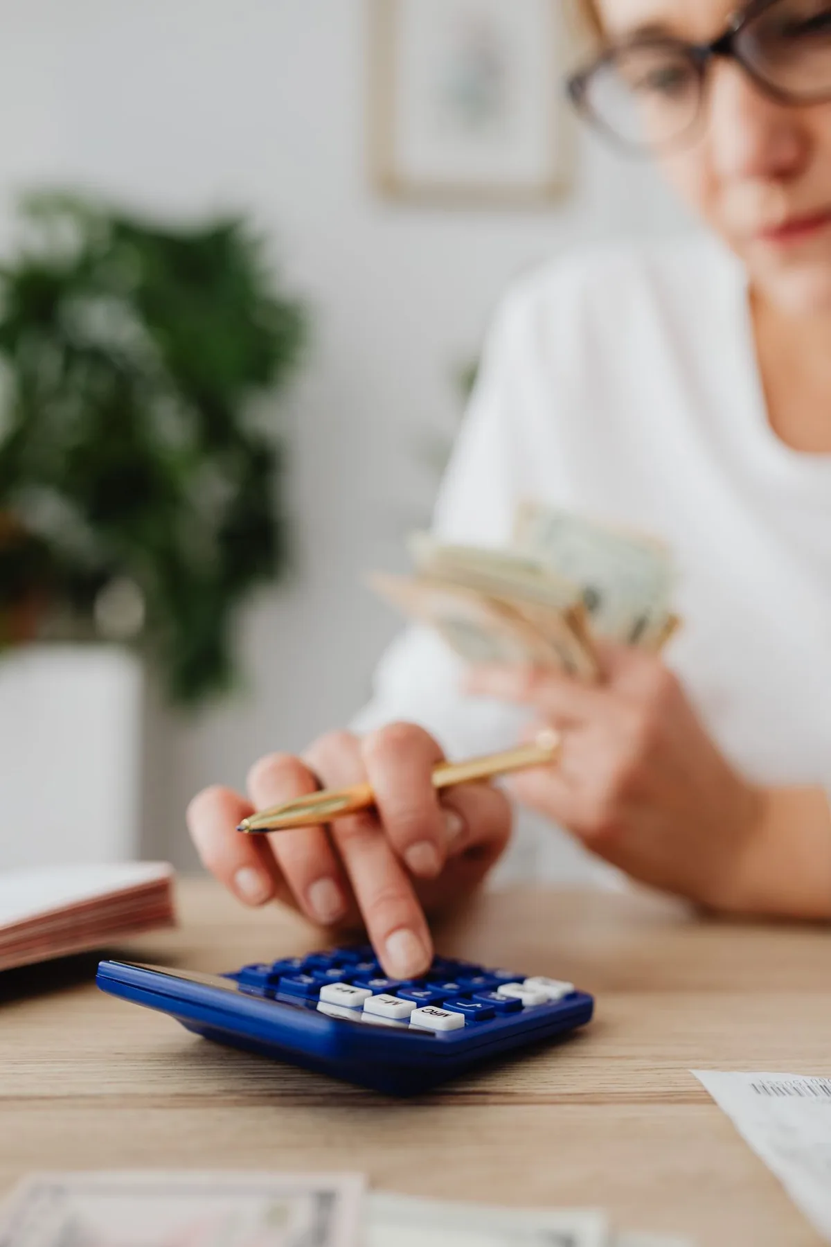 Illustrative photo: calculator and finance documents