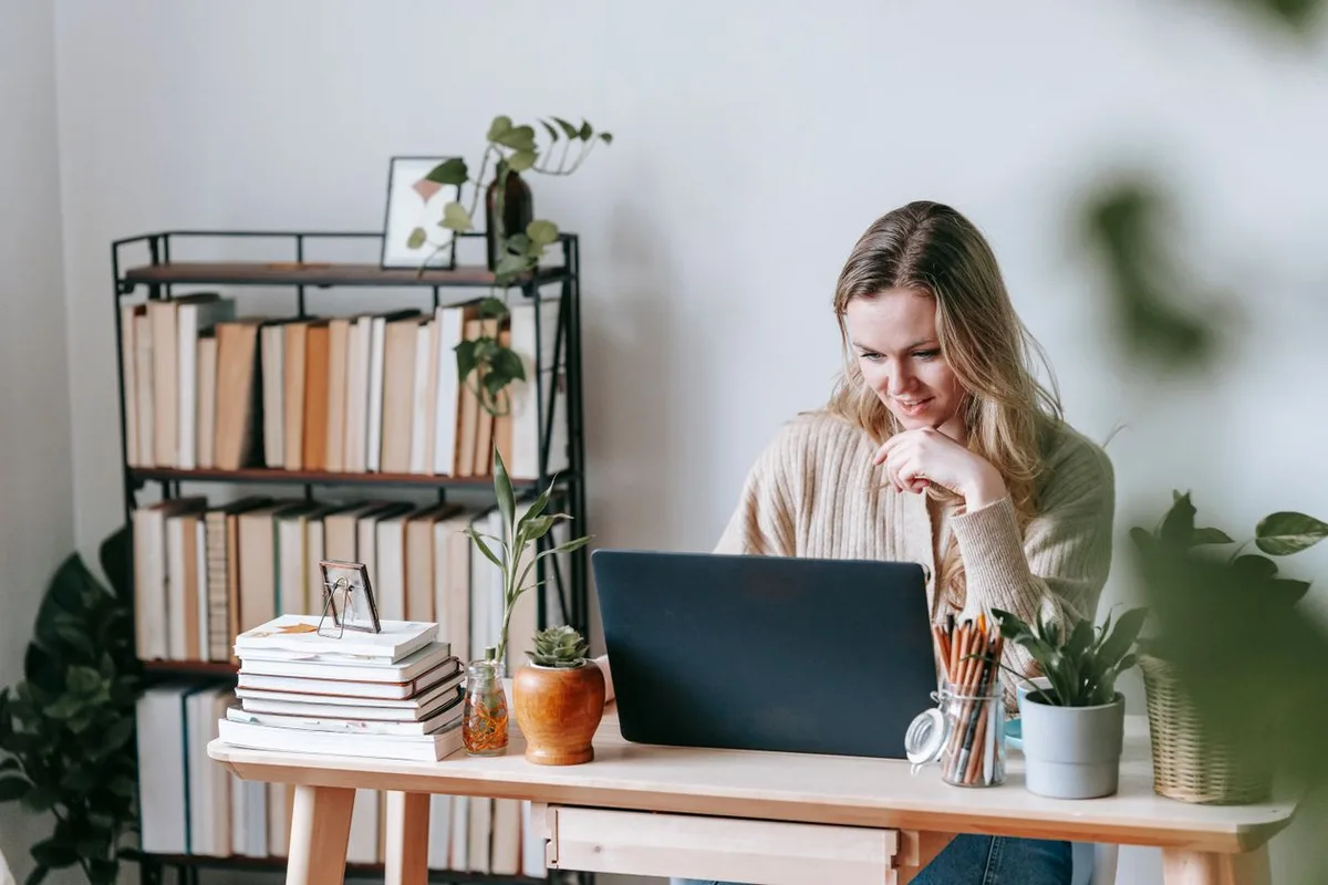 Illustrative photo: smiling professional at work