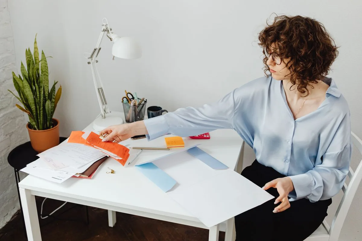 Illustrative photo: small business owner reviewing paperwork