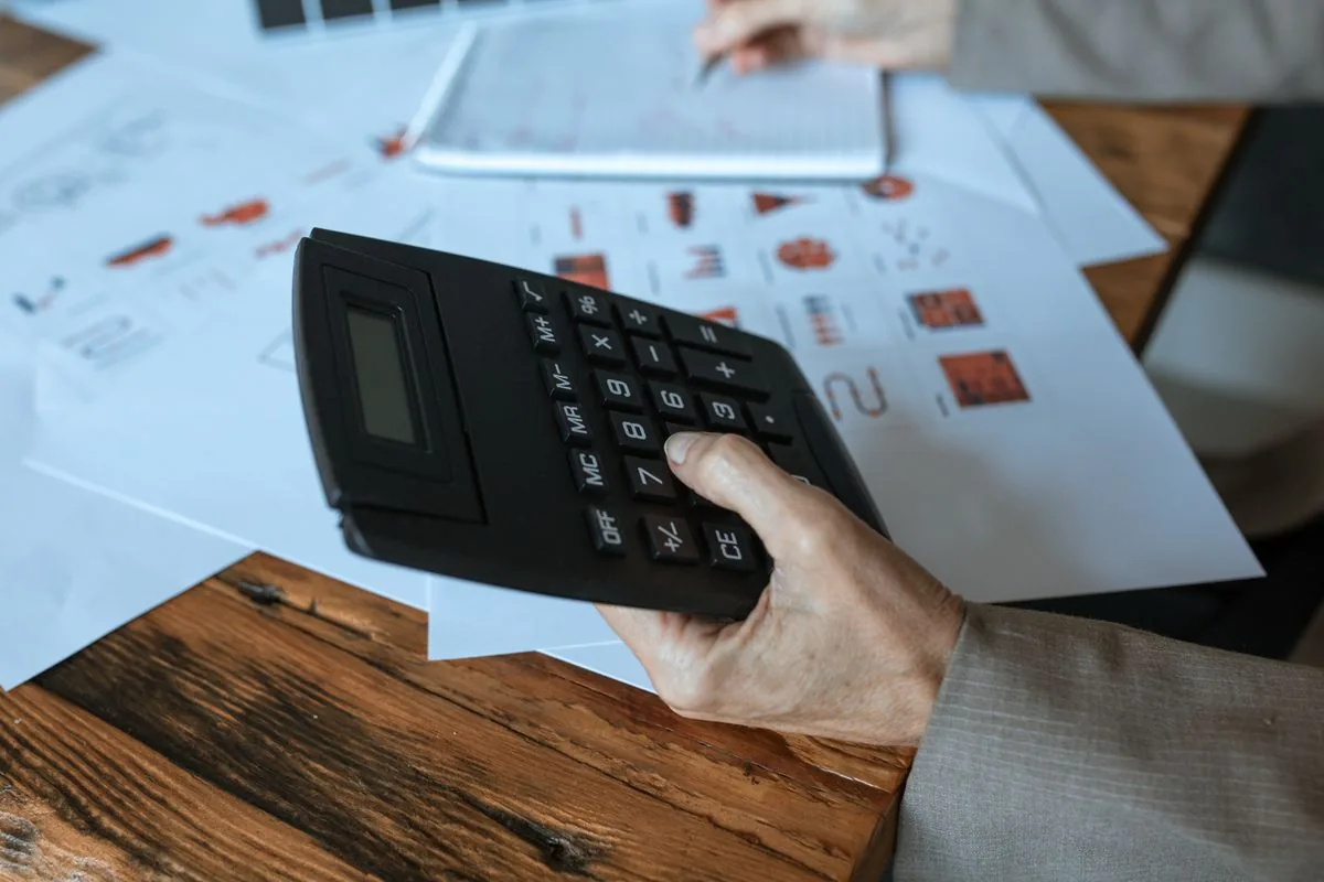 Illustrative photo: calculator and finance documents